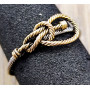 GOLD AND STEEL RING